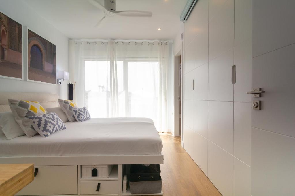 Posteľ alebo postele v izbe v ubytovaní Townhouse El Romeral