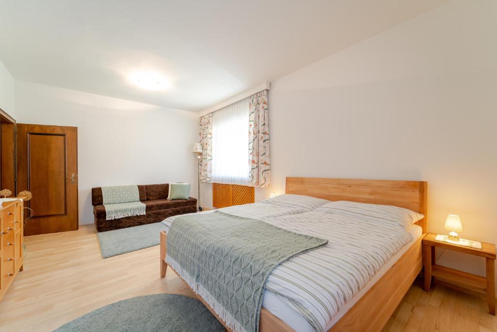 Posteľ alebo postele v izbe v ubytovaní Rosi's Wörthersee apartment