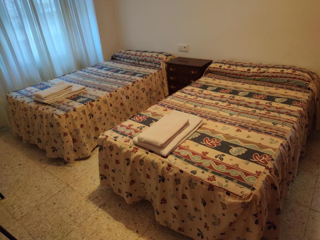 Posteľ alebo postele v izbe v ubytovaní Casa Ventana Cazorla