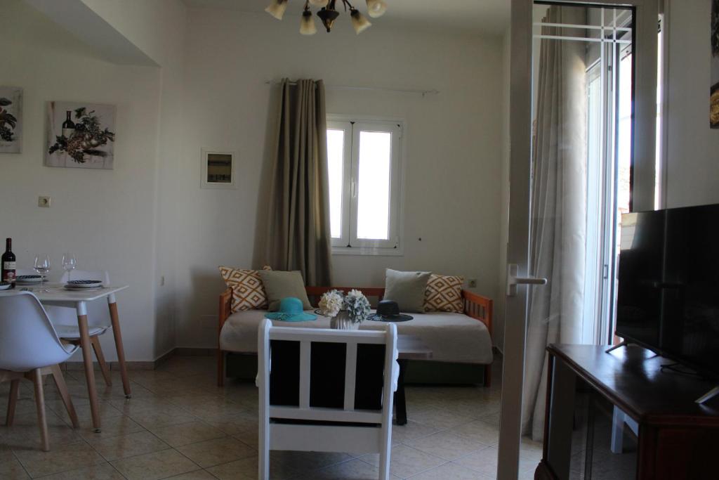 Posedenie v ubytovaní Dimokritos Apartment