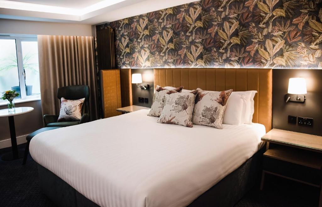 Postel nebo postele na pokoji v ubytování Hotel Kilkenny