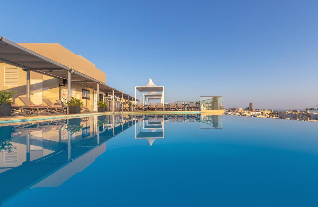 a view of the pool at the hotel at AX The Palace in Sliema