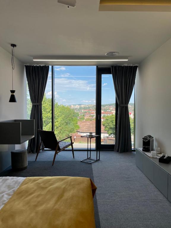 Postel nebo postele na pokoji v ubytování WERK Hotel & SPA