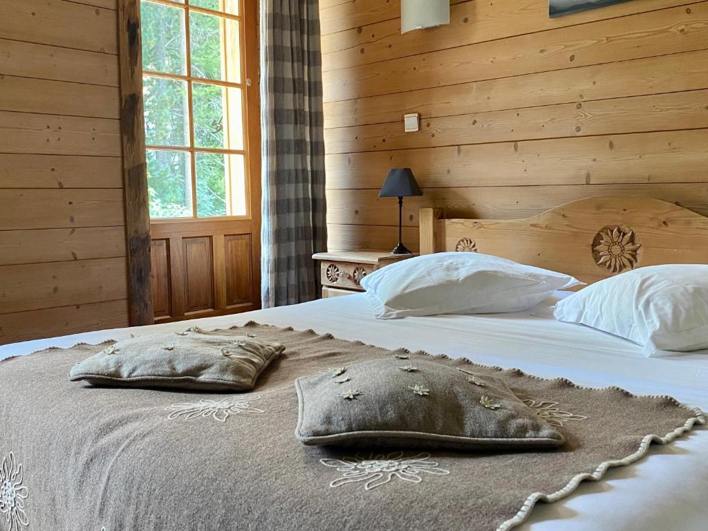 Postel nebo postele na pokoji v ubytování Alp'Hotel