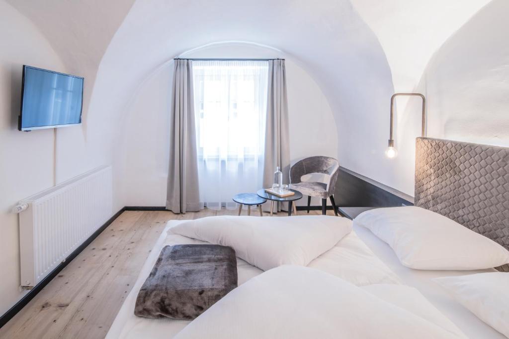 Postel nebo postele na pokoji v ubytování B&B Zur Traube