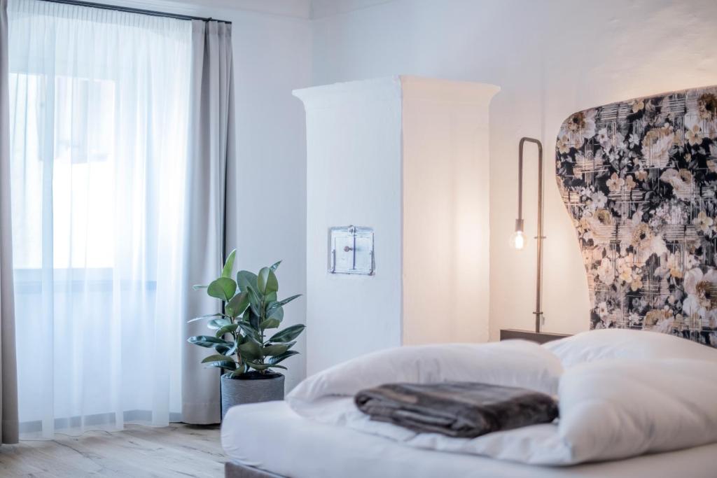 Postel nebo postele na pokoji v ubytování B&B Zur Traube