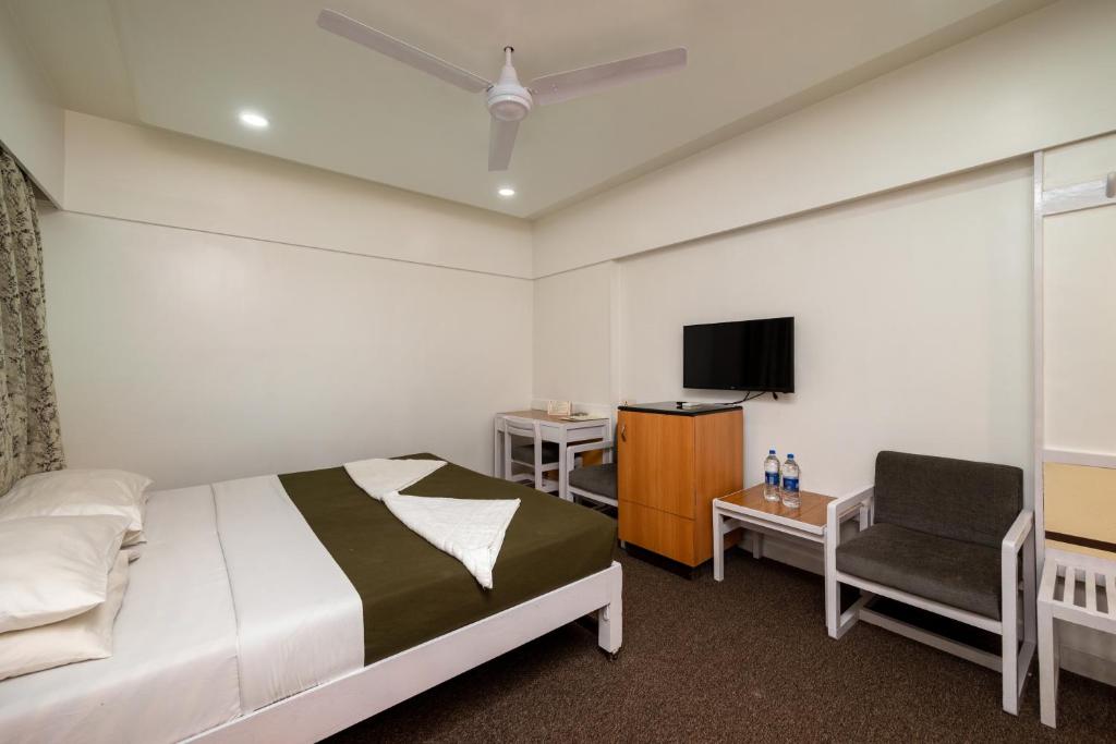 Postel nebo postele na pokoji v ubytování Hotel Balwas International