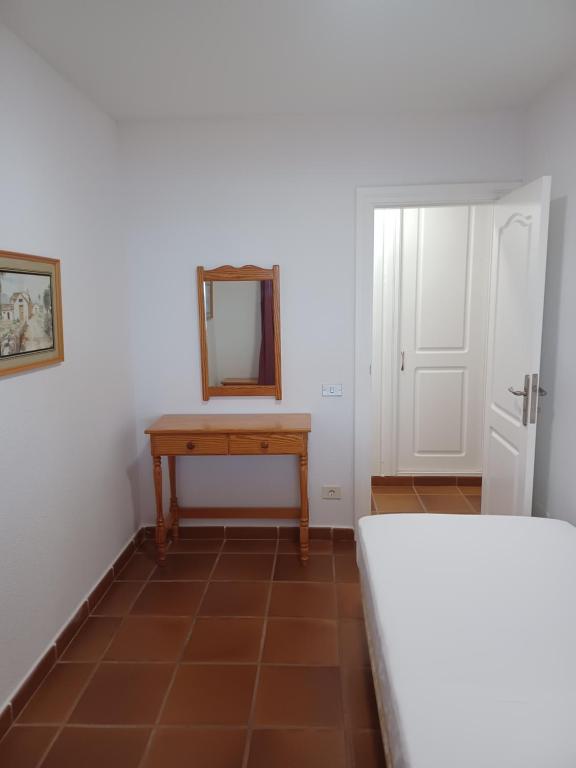 Postel nebo postele na pokoji v ubytování APARTAMENTO MAYI 2