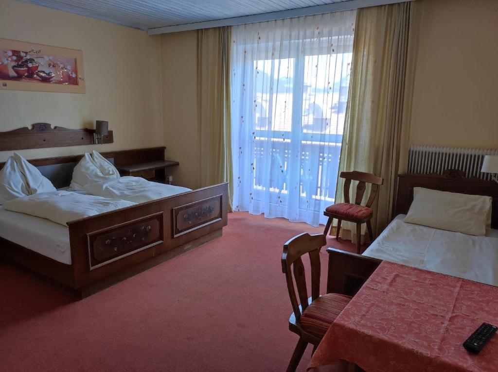 Postel nebo postele na pokoji v ubytování B&B Goldener Stern