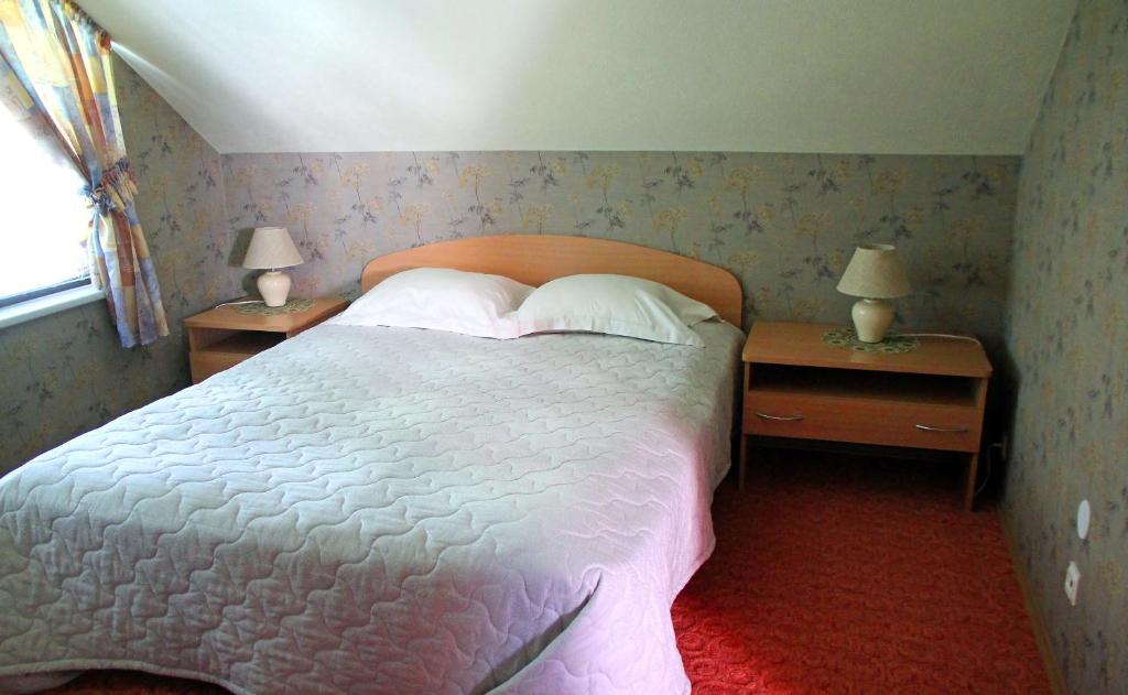 Postel nebo postele na pokoji v ubytování Rivaal Guesthouse-Cafe