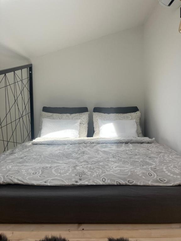 Posteľ alebo postele v izbe v ubytovaní Angelit Stúdió Apartman