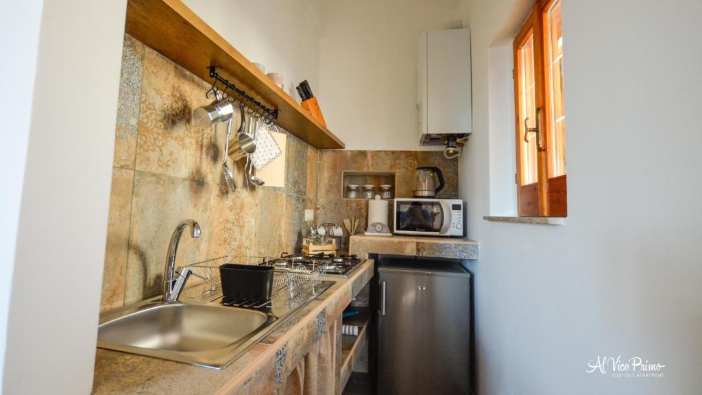 A kitchen or kitchenette at Al Vico Primo - Boutique Apartment