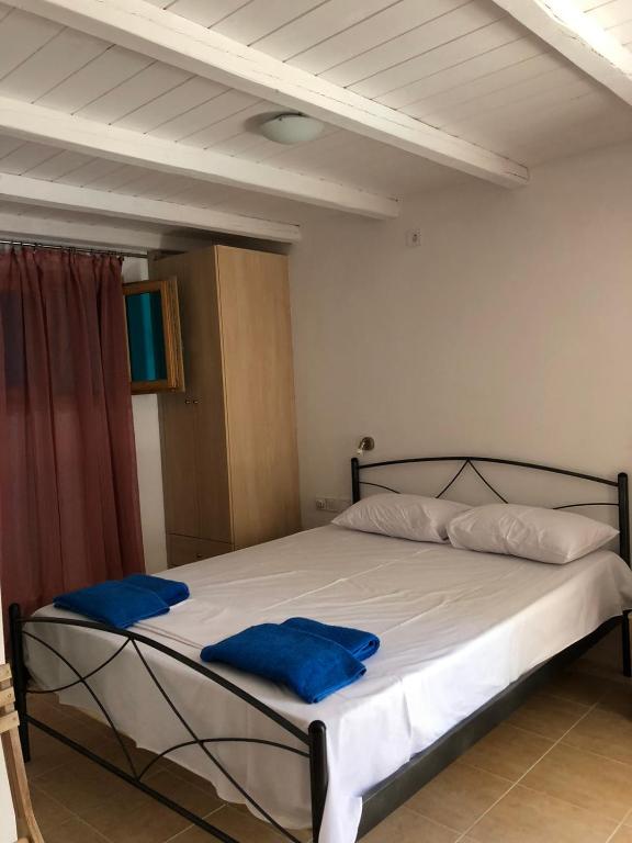 Postel nebo postele na pokoji v ubytování Serifos Sunset