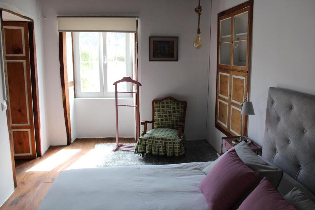 Postel nebo postele na pokoji v ubytování VILLA LA CAPIROTA