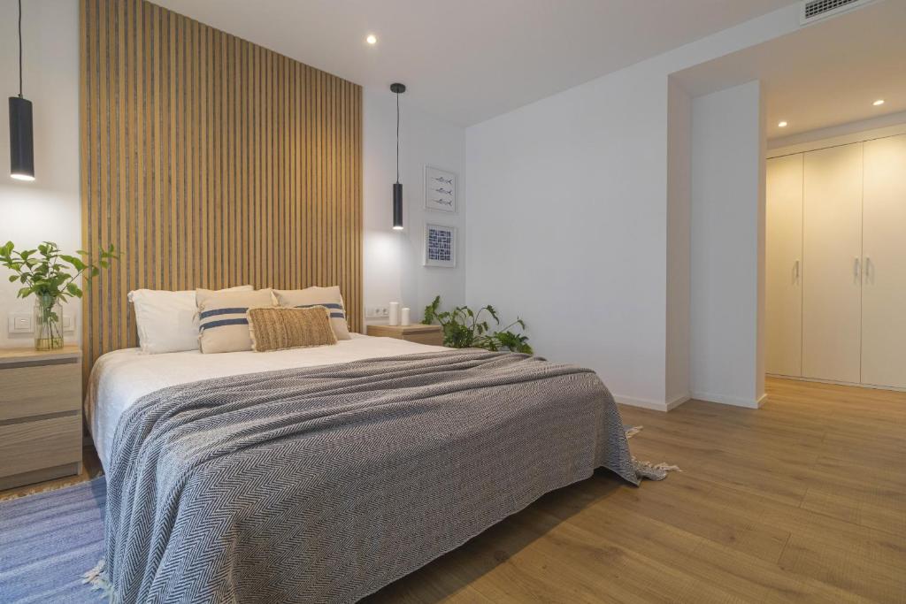 Postel nebo postele na pokoji v ubytování Vivalidays Apartour - Calella
