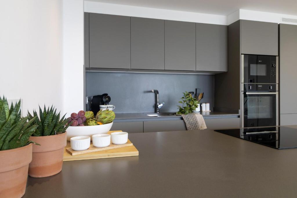 Kuchyň nebo kuchyňský kout v ubytování Vivalidays Apartour - Calella