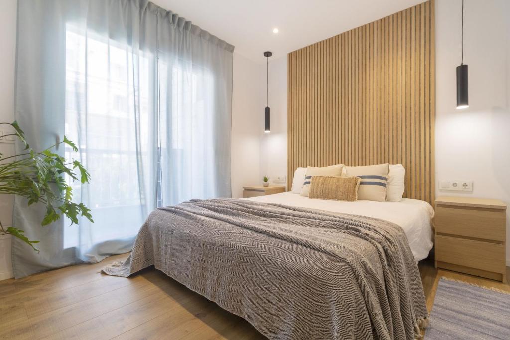 Postel nebo postele na pokoji v ubytování Vivalidays Apartour - Calella