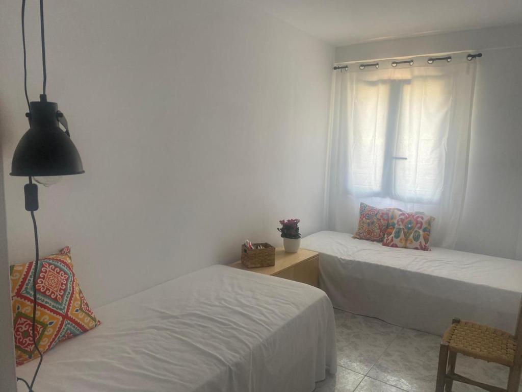 Postel nebo postele na pokoji v ubytování Apartamento Rincón del Cielo
