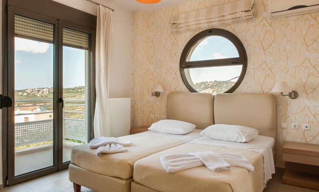 Łóżko lub łóżka w pokoju w obiekcie Salvia Villas