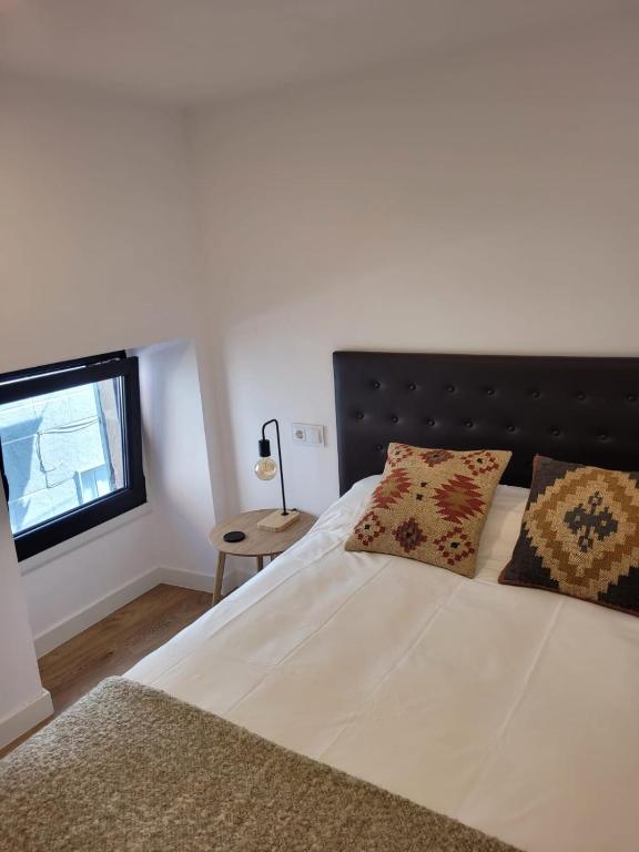 Postel nebo postele na pokoji v ubytování A Casina