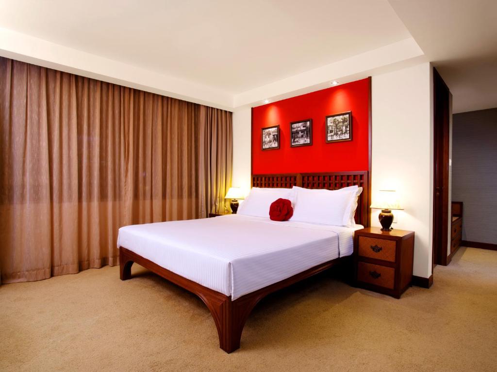 Кровать или кровати в номере Butterfly on Wellington Boutique Hotel Central