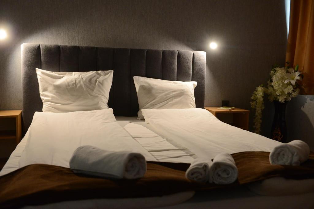 Postel nebo postele na pokoji v ubytování Family Hotel Gotse Delchev
