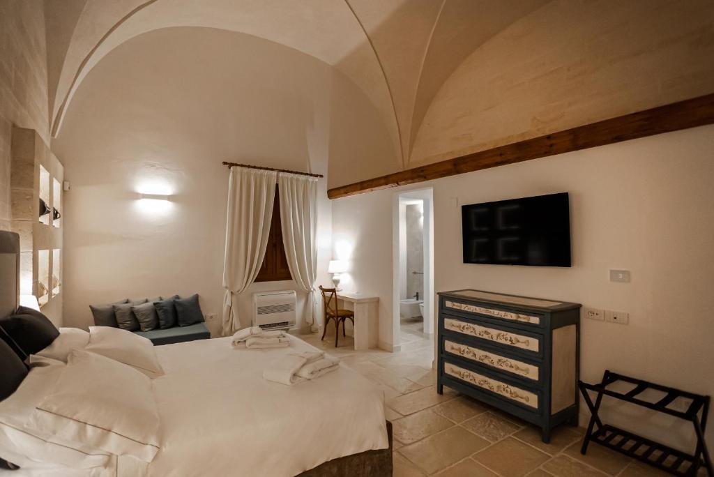 TV a/nebo společenská místnost v ubytování Masseria Torleanzi Wine Relais