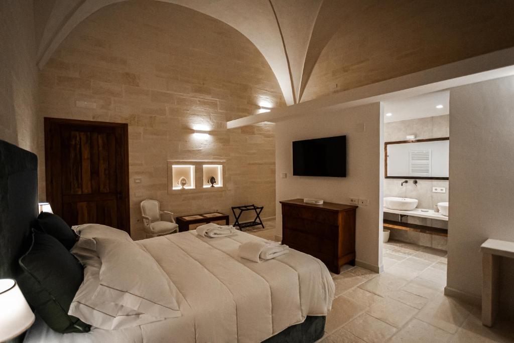 TV a/nebo společenská místnost v ubytování Masseria Torleanzi Wine Relais
