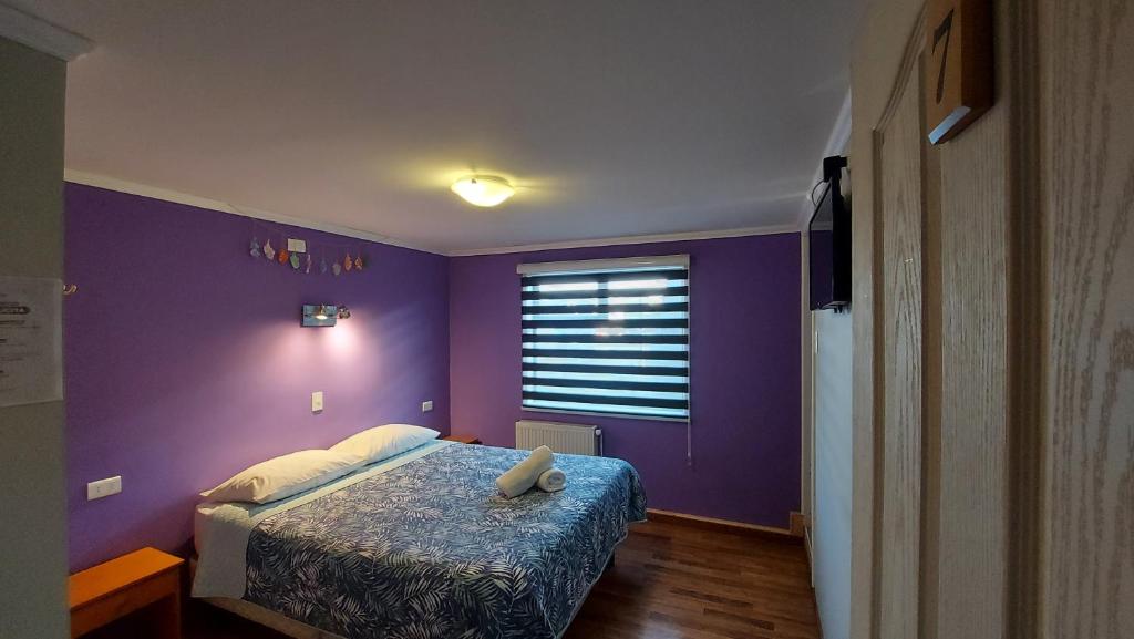 Postel nebo postele na pokoji v ubytování Hostal La Base