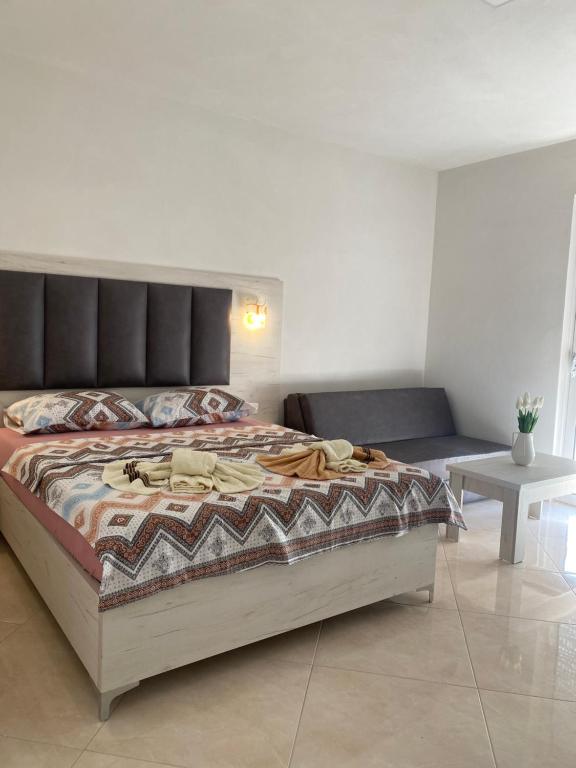 Postel nebo postele na pokoji v ubytování Apartments Catalic