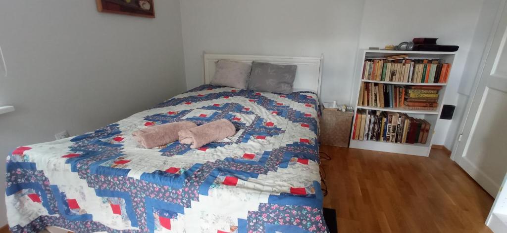 Postel nebo postele na pokoji v ubytování Herne Homestay