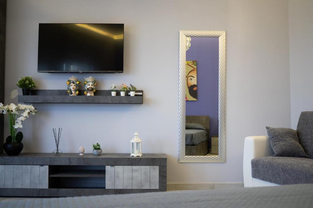 Posedenie v ubytovaní Tyche apartaments & rooms