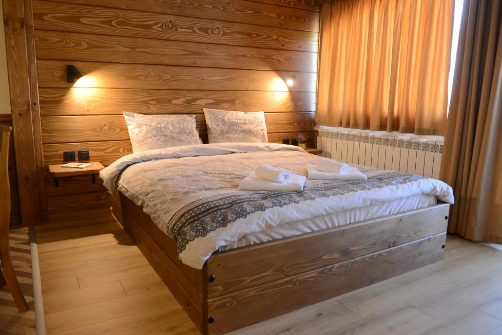 Postel nebo postele na pokoji v ubytování Family Hotel Gotse Delchev