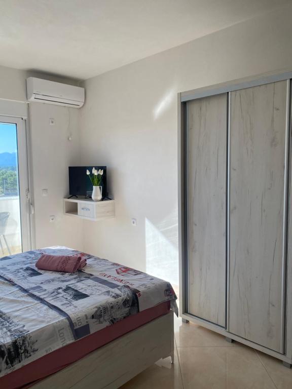 Postel nebo postele na pokoji v ubytování Apartments Catalic
