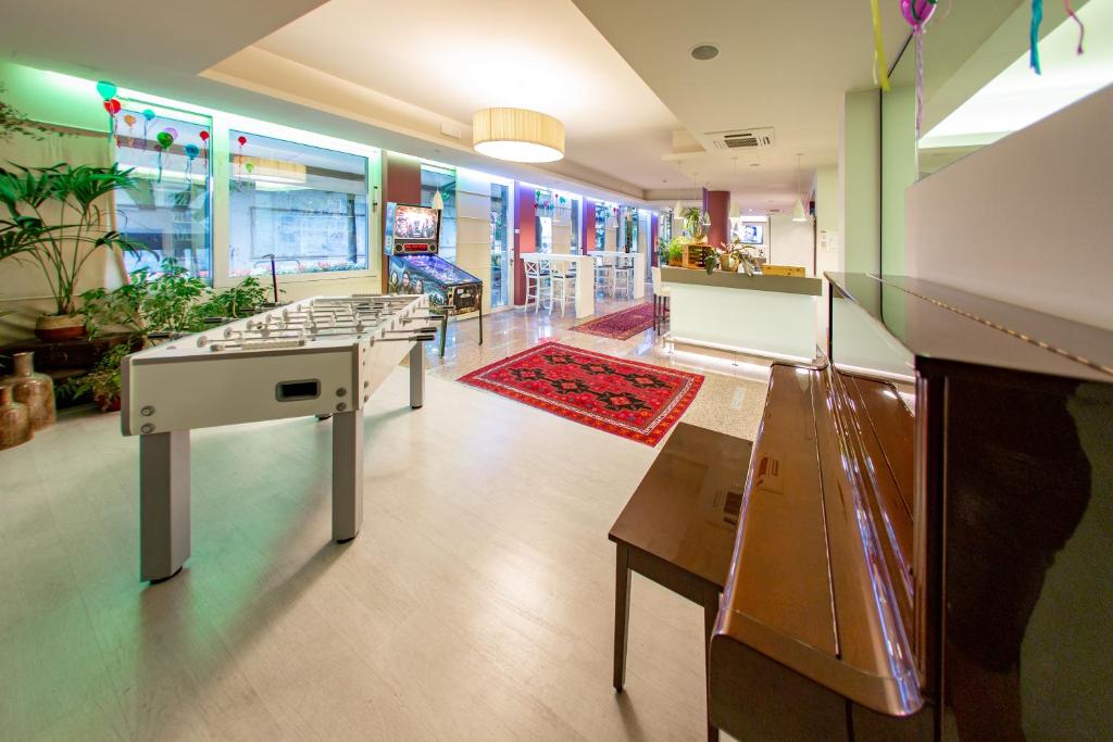 TV a/nebo společenská místnost v ubytování Hotel Bonotto
