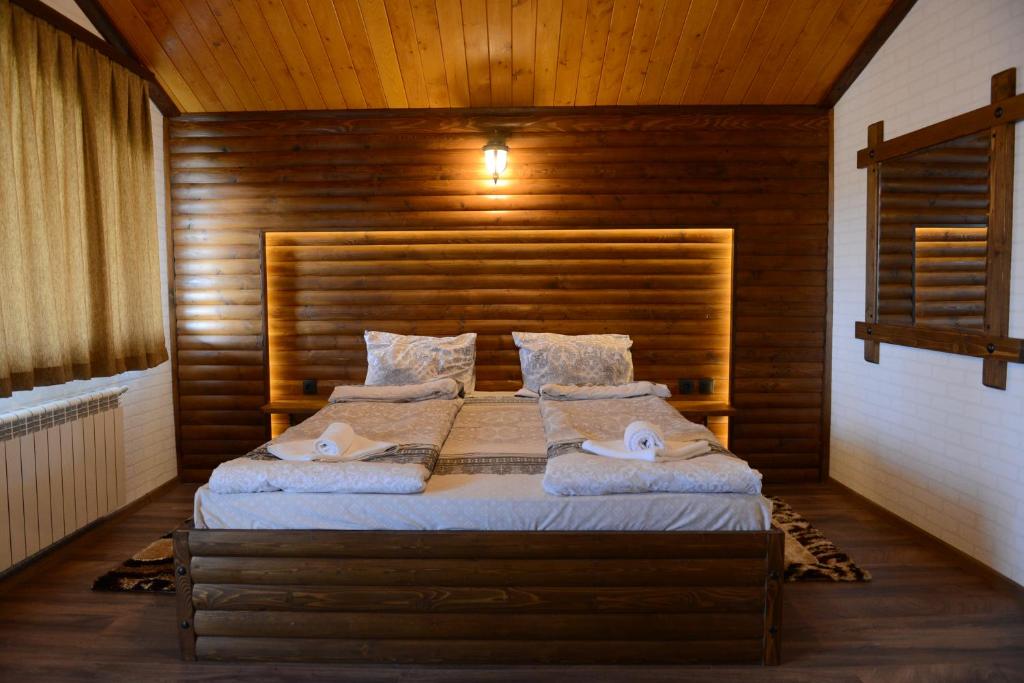 Postel nebo postele na pokoji v ubytování Family Hotel Gotse Delchev