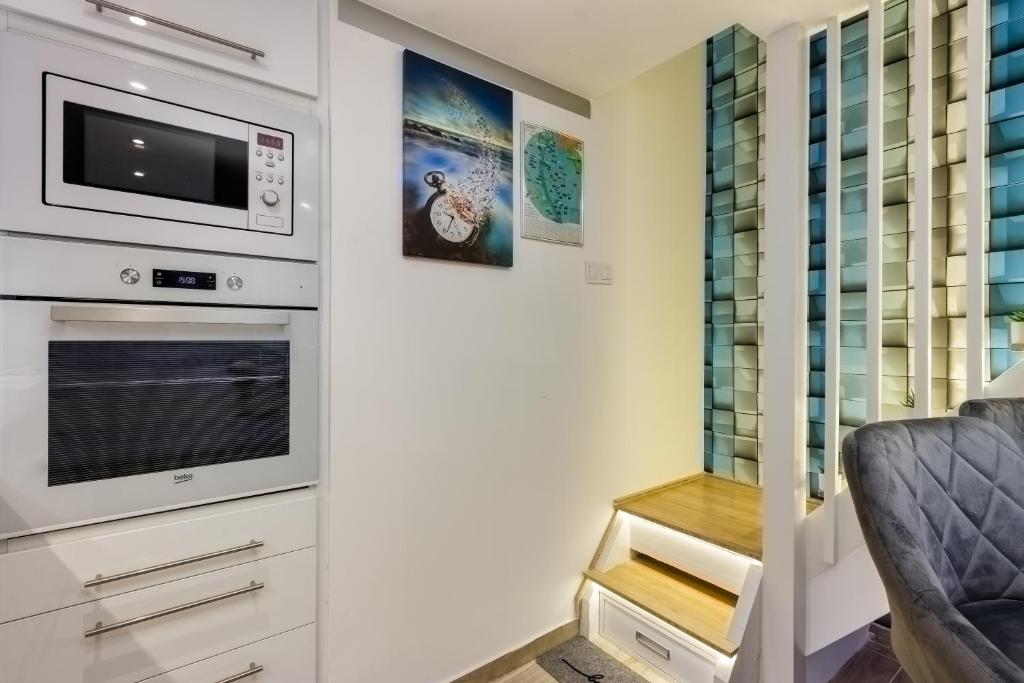 Televízia a/alebo spoločenská miestnosť v ubytovaní B2 City Center, Dohany street