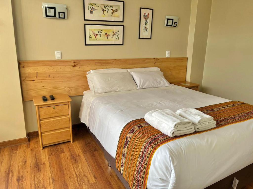 Postel nebo postele na pokoji v ubytování Hostal Casona Arrambide