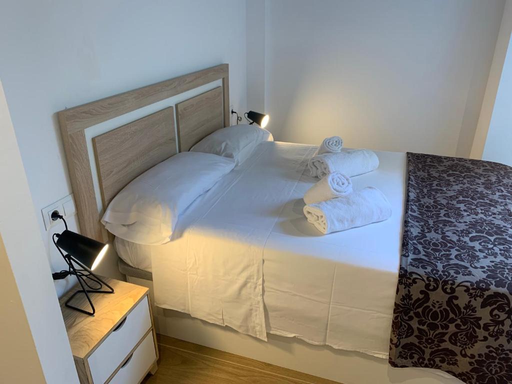 Posteľ alebo postele v izbe v ubytovaní Patio Port Serrallo