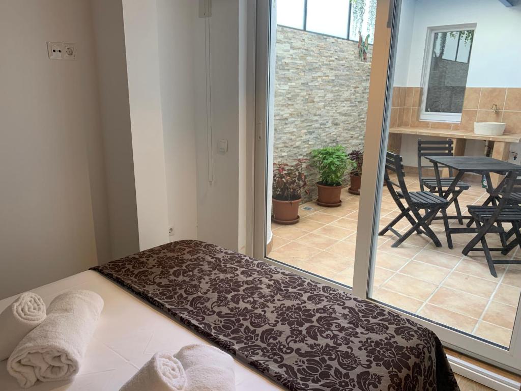 Posteľ alebo postele v izbe v ubytovaní Patio Port Serrallo