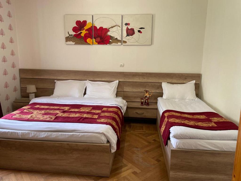 A bed or beds in a room at Story Guesthouse