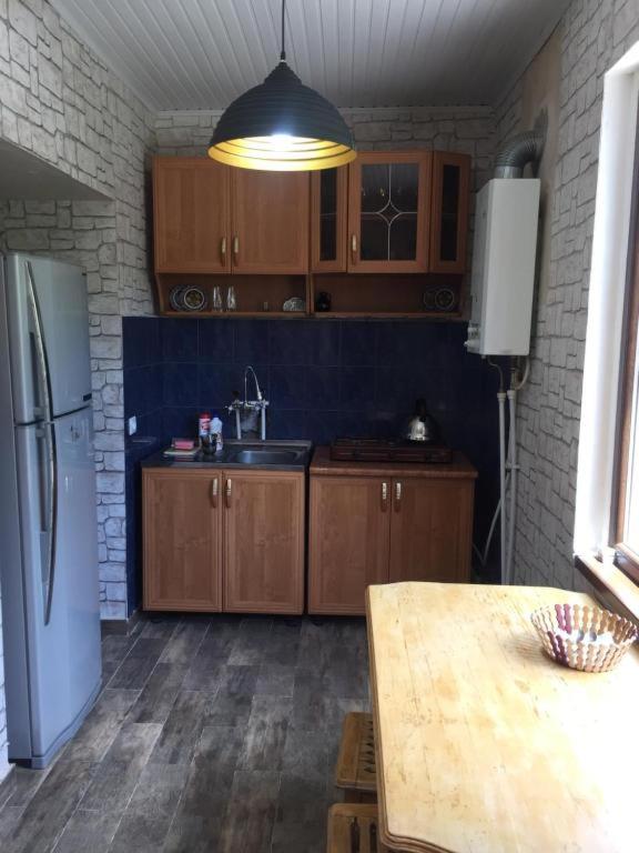 A kitchen or kitchenette at Story Guesthouse