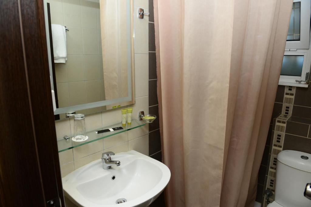 Koupelna v ubytování Ionion Hotel