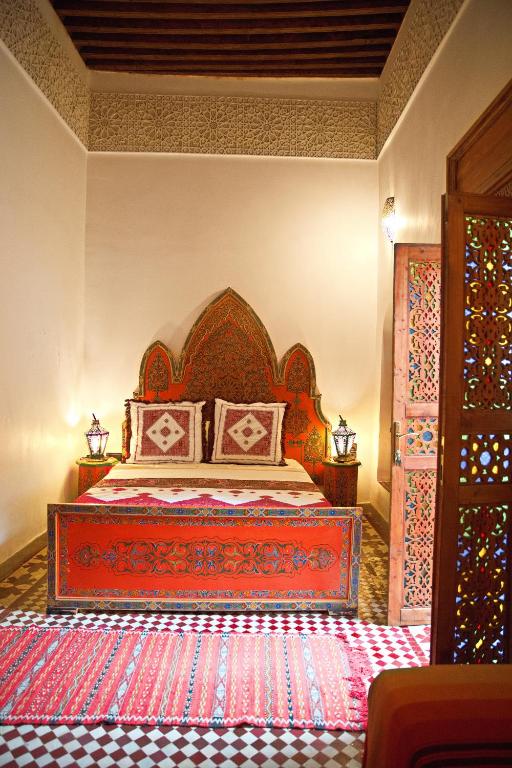 Postel nebo postele na pokoji v ubytování Riad Ouliya