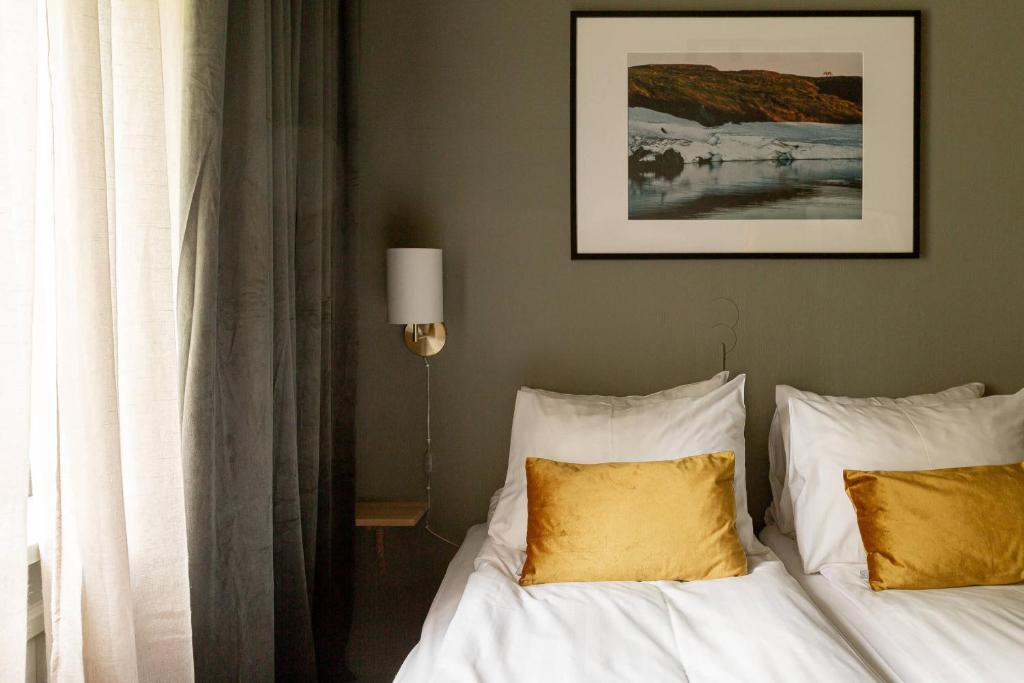 En eller flere senge i et værelse på Hotell Åre Fjällsätra