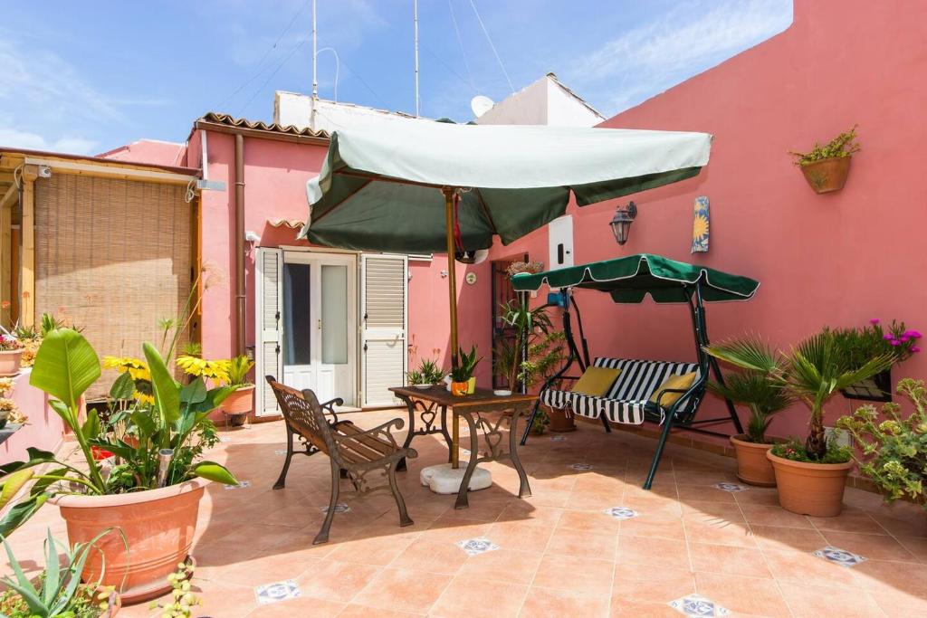 Patio nebo venkovní prostory v ubytování L'Isola Di Ortigia
