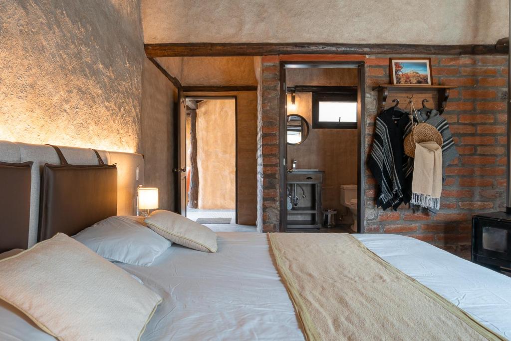 Postel nebo postele na pokoji v ubytování Chilcabamba Lodge