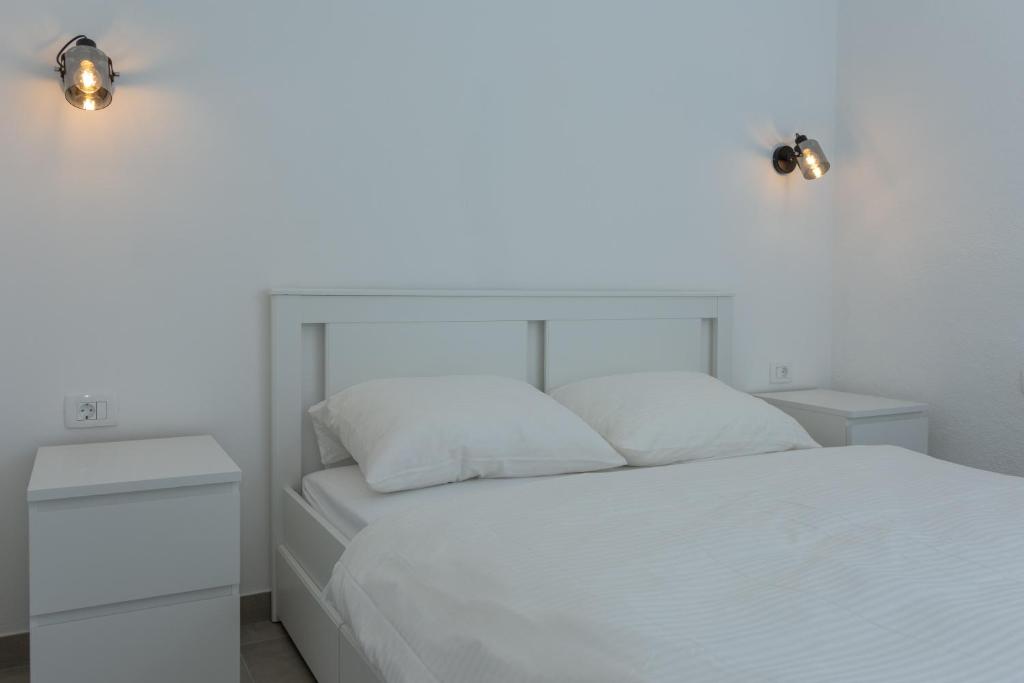 Posteľ alebo postele v izbe v ubytovaní The View Split. Highlight with Roof-Top-Terrace and Pool