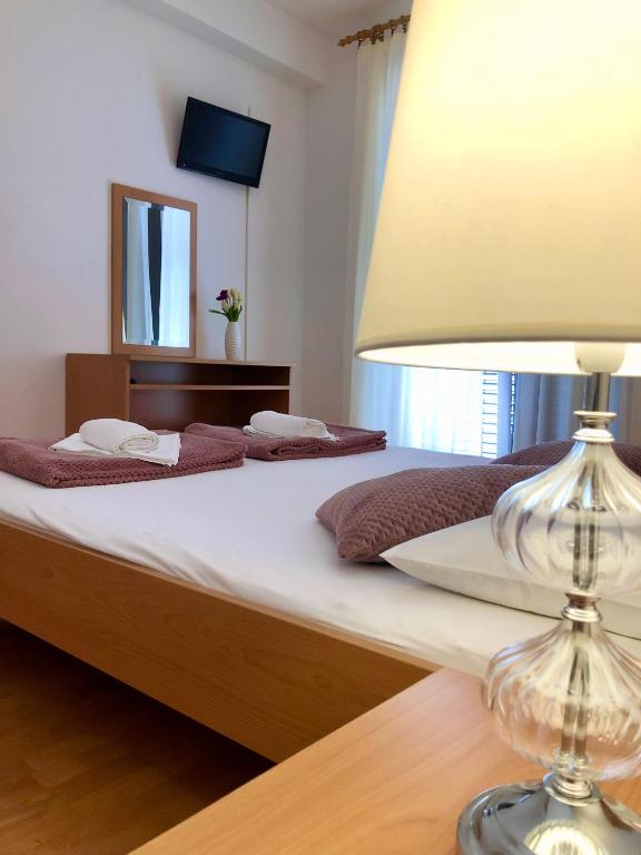 Postel nebo postele na pokoji v ubytování Hotel B&B CHAMBERLAIN