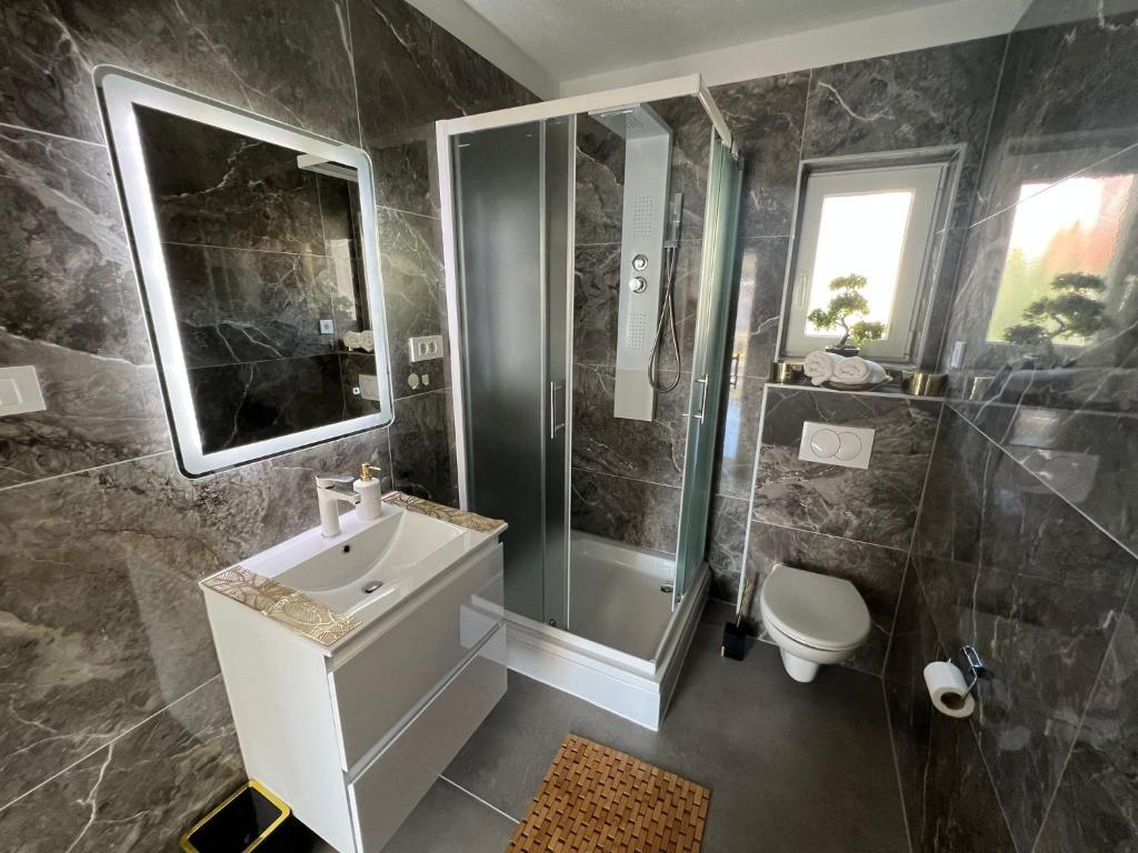 Kúpeľňa v ubytovaní Deluxe Apartment Zadar